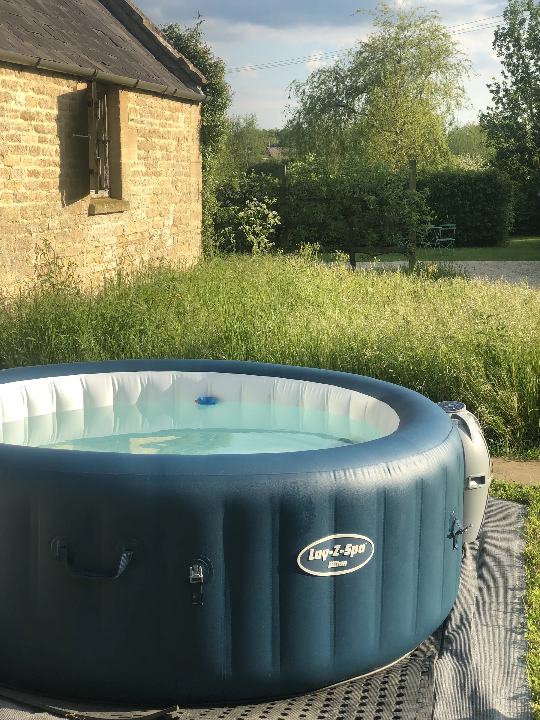 A hot tub set up in a Cotswold garden
